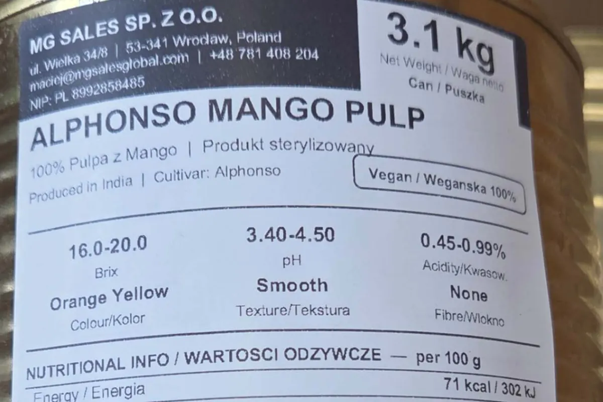 3.1 kg can of Alphonso mango pulp with MG SALES label